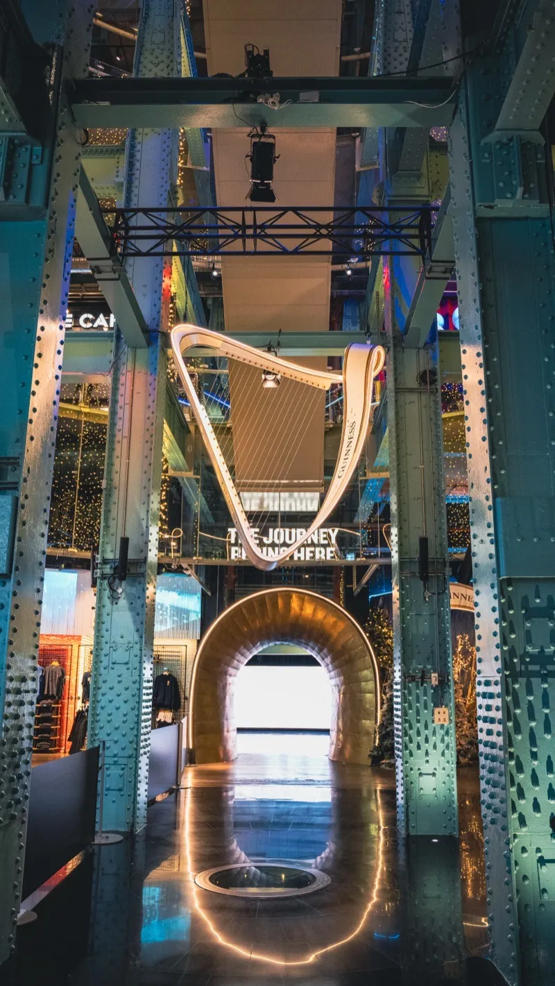 Illuminated harp archway inside the Guinness Storehouse